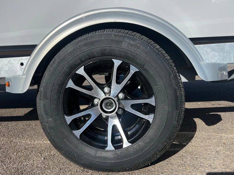 Slide: The Image of Close-up of 2024 Fish Rite Angler 18 trailer wheel and tire. - 19