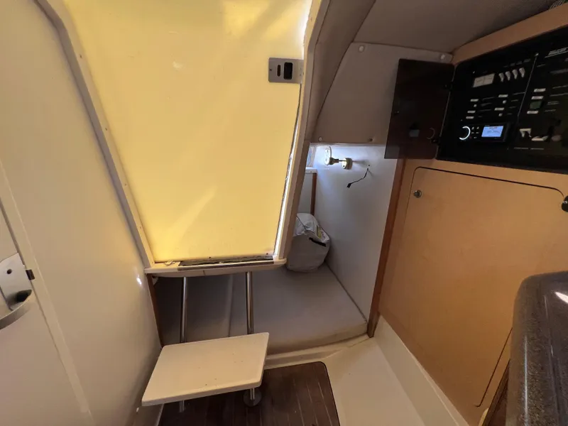 Slide: The Image of Interior cabin of a 2000 Boston Whaler 28 Conquest boat. - 36