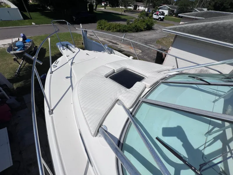 Slide: The Image of 2000 Boston Whaler 28 Conquest boat deck with windshield and railing. - 41