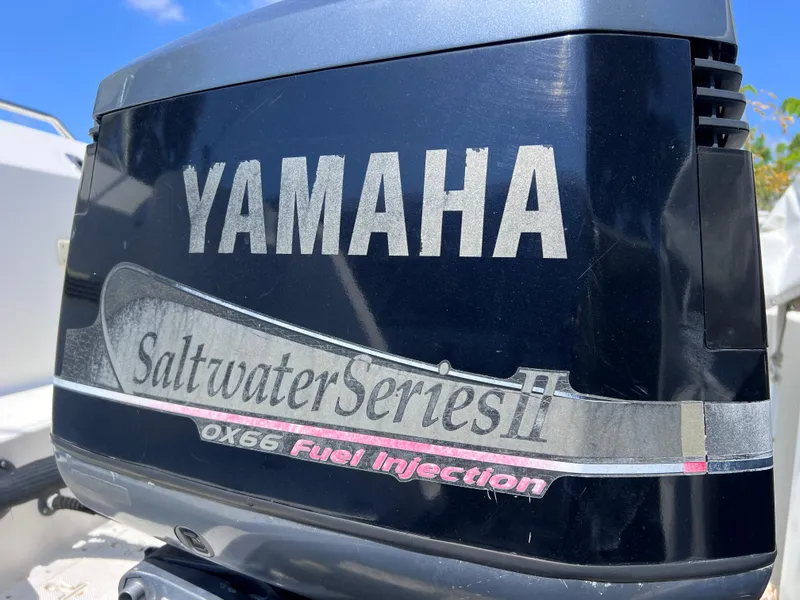 Slide: The Image of Yamaha Saltwater Series II OX66 Fuel Injection outboard motor on 2000 Boston Whaler 28 Conquest. - 48
