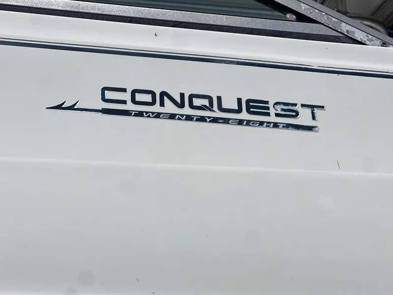 Slide: The Image of 2000 Boston Whaler 28 Conquest boat model nameplate - 49