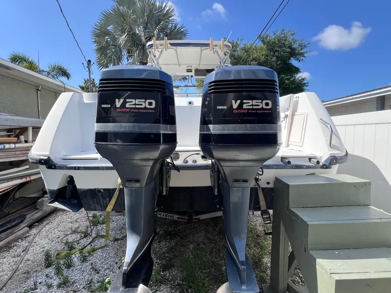 Slide: The Image of 2000 Boston Whaler 28 Conquest with twin Yamaha V250 outboard engines. - 8