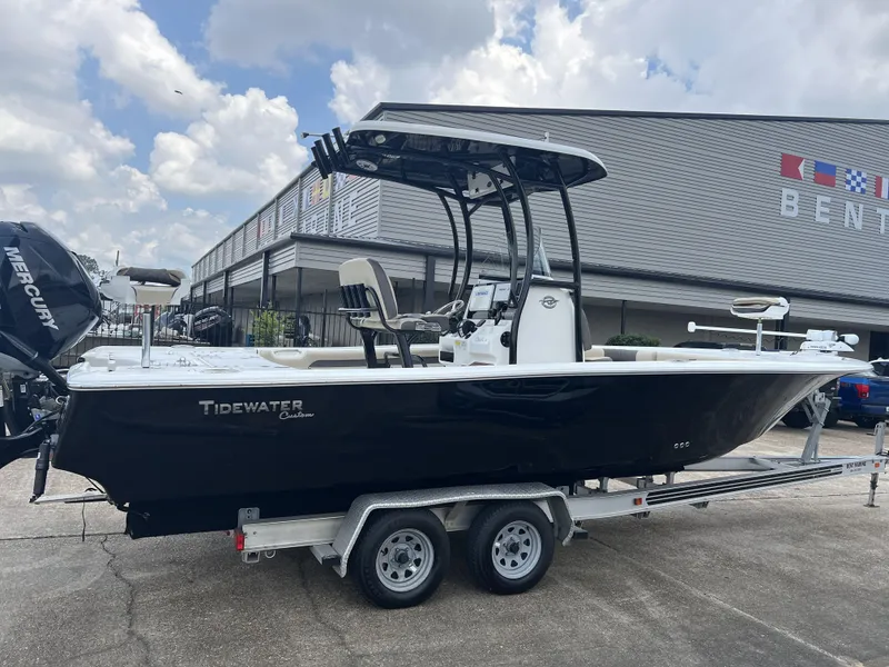 Slide: The Image of 2021 Tidewater 2500 Carolina Bay boat on trailer outside dealership. - 11