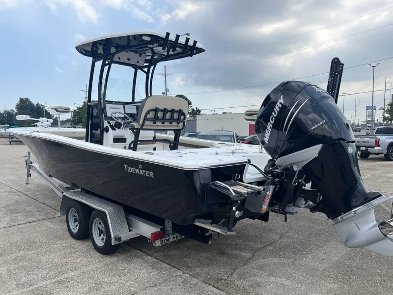 Slide: The Image of 2021 Tidewater 2500 Carolina Bay boat on trailer with Mercury Verado engine. - 12
