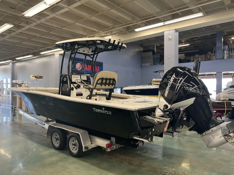 Slide: The Image of 2021 Tidewater 2500 Carolina Bay boat on trailer in indoor showroom. - 4