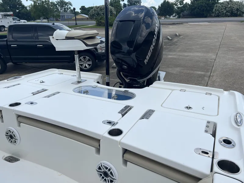 Slide: The Image of 2021 Tidewater 2500 Carolina Bay boat with Mercury outboard motor in parking lot. - 8