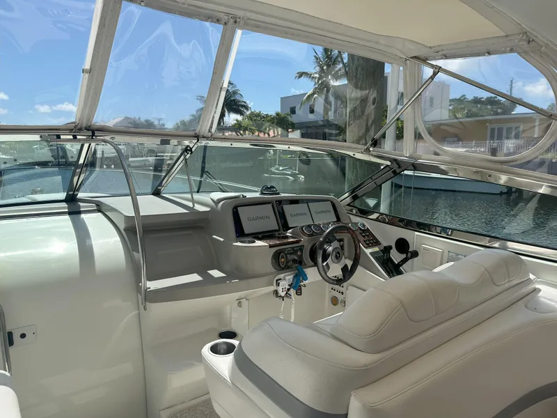 Slide: The Image of 2004 Formula 330 SS boat cockpit with modern navigation system. - 17