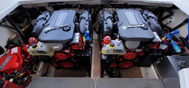 Slide: The Image of 2004 Formula 330 SS engine compartment with dual engines and clean layout. - 25