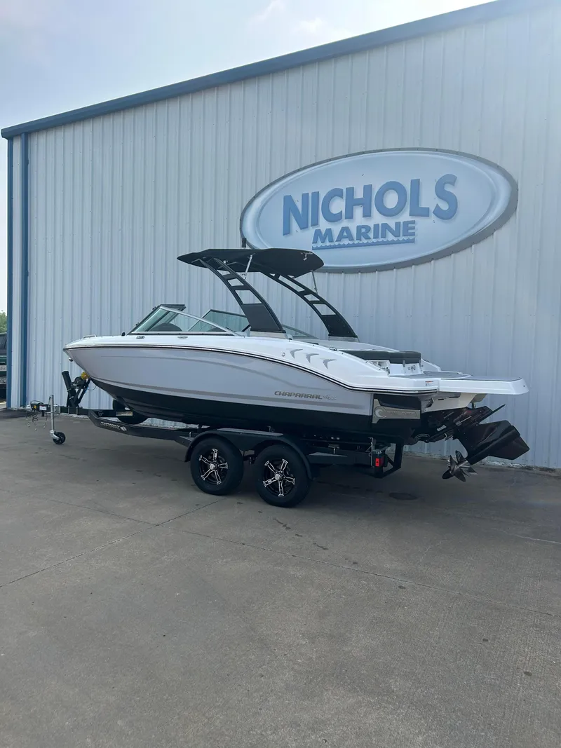Slide: The Image of 2024 Chaparral 21 Surf boat at Nichols Marine dealership. - 3