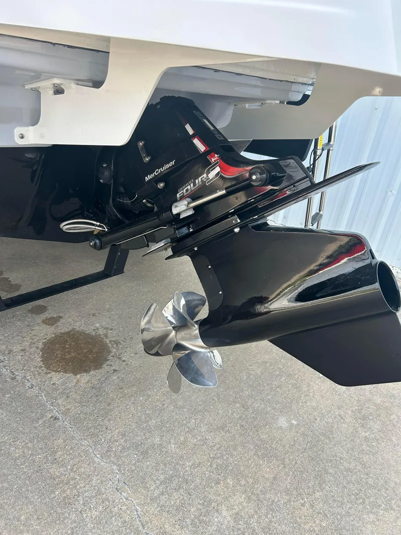 Slide: The Image of 2024 Chaparral 21 Surf boat stern drive and propeller close-up. - 4