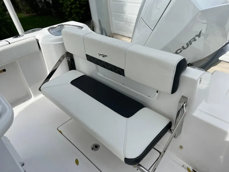 Slide: The Image of RTIC cooler on a 2023 Tidewater 220 CC Adventure boat. - 16