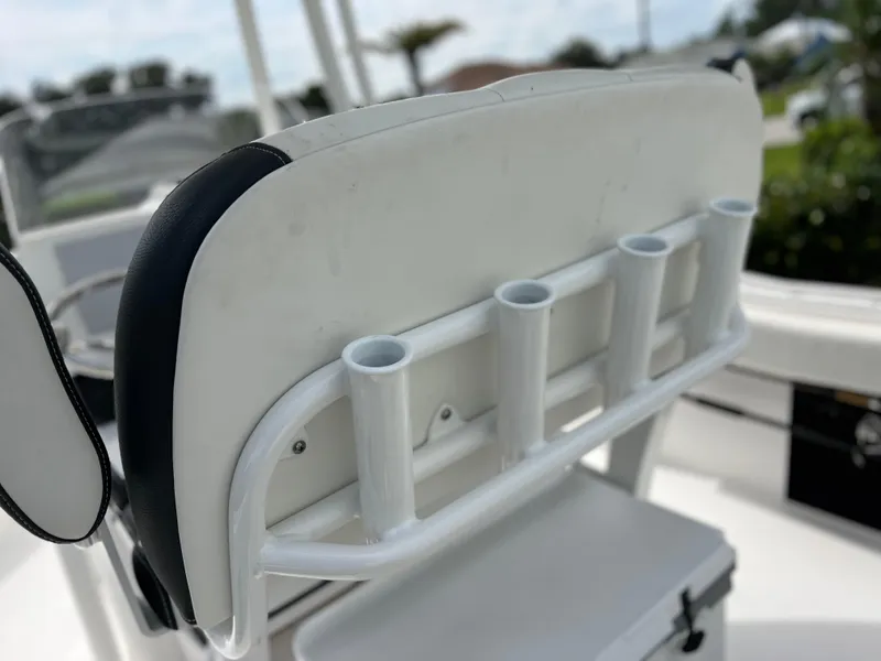 Slide: The Image of 2023 Tidewater 220 CC Adventure boat with rod holders and speakers. - 18