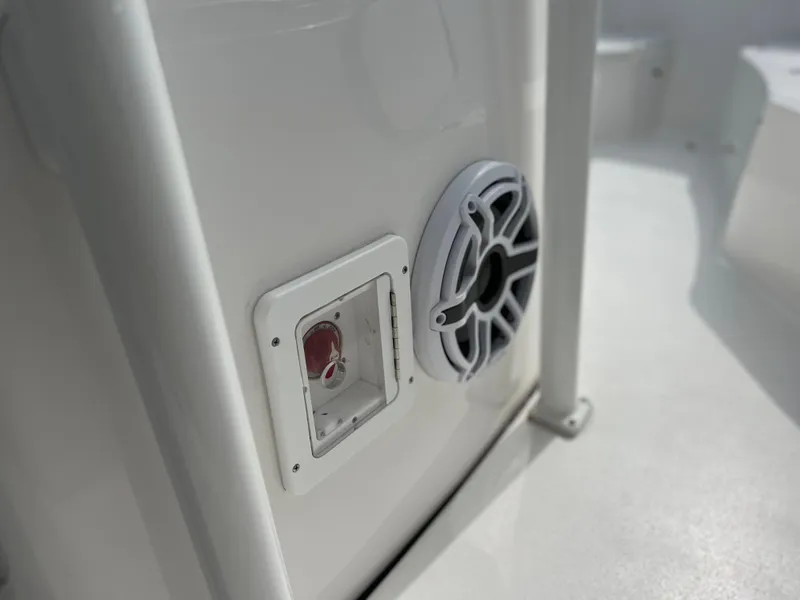 Slide: The Image of Close-up of a 2023 Tidewater 220 CC Adventure boat speaker. - 24