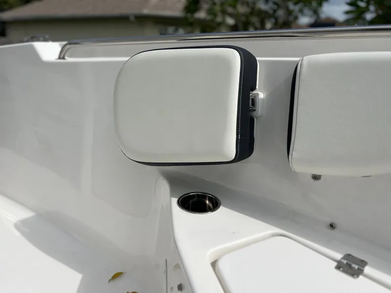 Slide: The Image of 2023 Tidewater 220 CC Adventure boat bow seating with built-in speakers. - 30