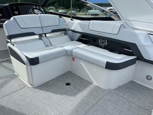 Slide: The Image of 2025 Formula 330 Crossover Bowrider I/O interior seating area with modern design. - 10