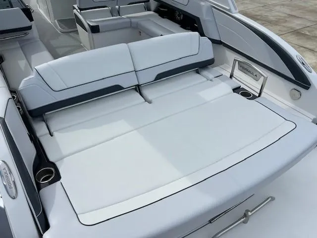 Slide: The Image of 2025 Formula 330 Crossover Bowrider I/O, spacious rear seating and sunbathing area. - 8