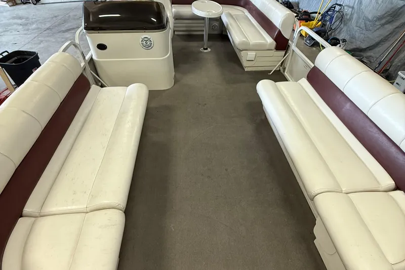 Slide: The Image of 2007 Crestliner 2185 Batata Bay boat interior with white and maroon seating. - 6