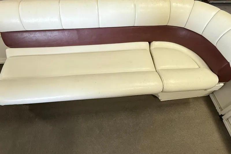 Slide: The Image of Cream and brown seating in 2007 Crestliner 2185 Batata Bay boat interior. - 8