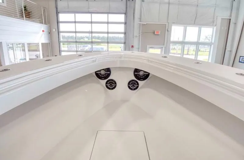 Slide: The Image of 2025 Onslow Bay 27 Offshore Edition boat interior in showroom. - 11