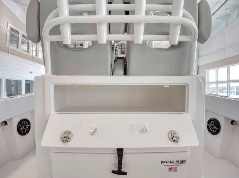 Slide: The Image of 2025 Onslow Bay 27 Offshore Edition boat interior with storage compartment. - 14
