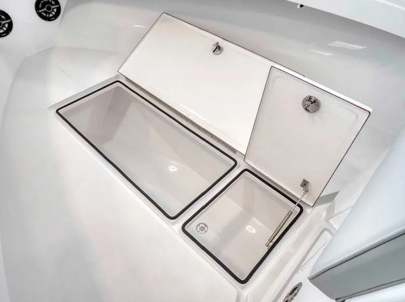 Slide: The Image of 2025 Onslow Bay 27 Offshore Edition storage compartments. - 16