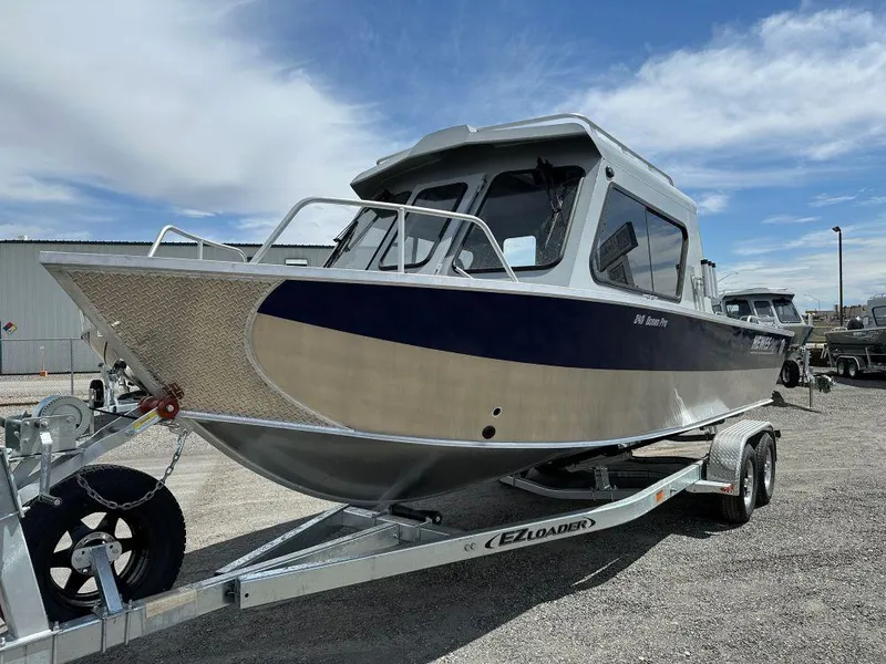 The Image of 2024 Hewescraft 240 Ocean Pro ET boat on EZ Loader trailer. - 0