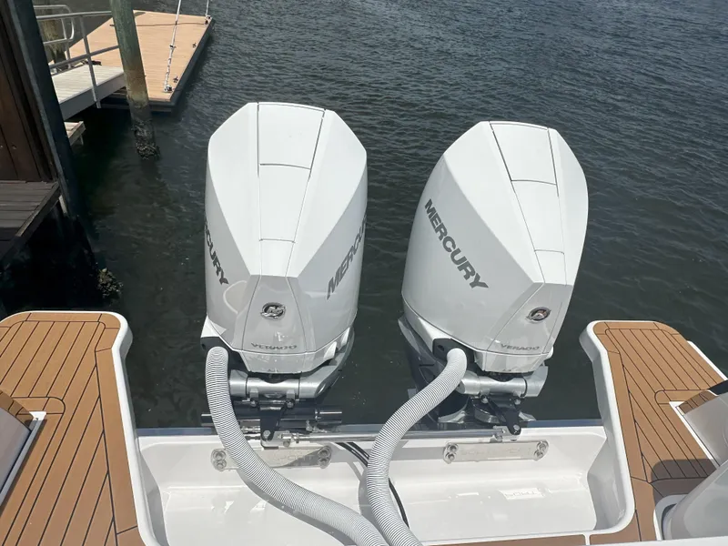 Slide: The Image of 2024 Southport 30 FE boat with twin Mercury outboard engines. - 18