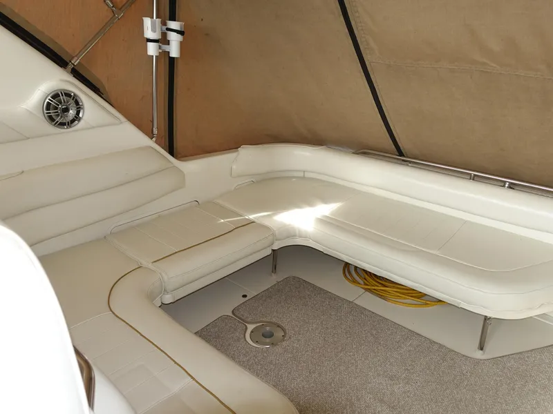 Slide: The Image of Interior seating of 1996 Sea Ray 370 Sundancer yacht with beige upholstery. - 4
