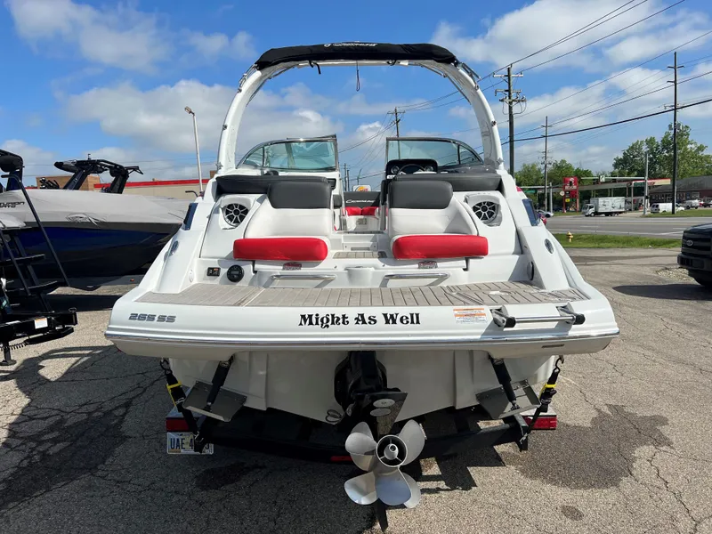 Slide: The Image of 2022 Crownline 265 SS boat with dual seating and Might As Well name on the stern. - 11
