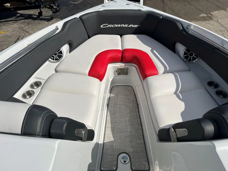 Slide: The Image of 2022 Crownline 265 SS boat with luxurious seating and modern design. - 2