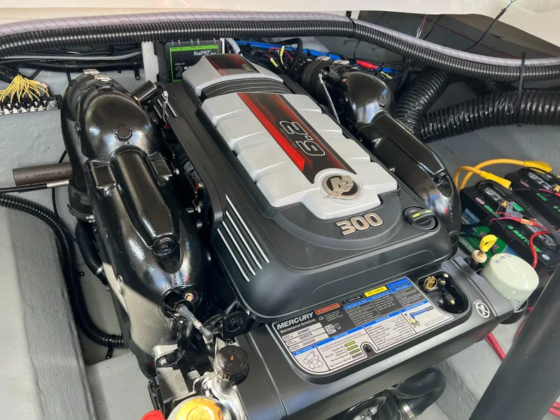 Slide: The Image of 2022 Crownline 265 SS boat engine compartment with Mercury 300 HP engine. - 6