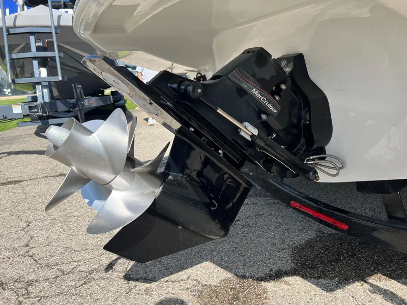 Slide: The Image of 2022 Crownline 265 SS boat with MerCruiser outdrive and dual propellers. - 9