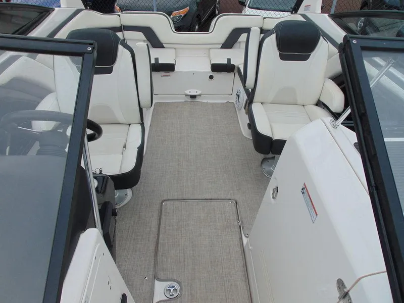 Slide: The Image of 2016 Yamaha Boats 242 Limited interior seating and cockpit area. - 11