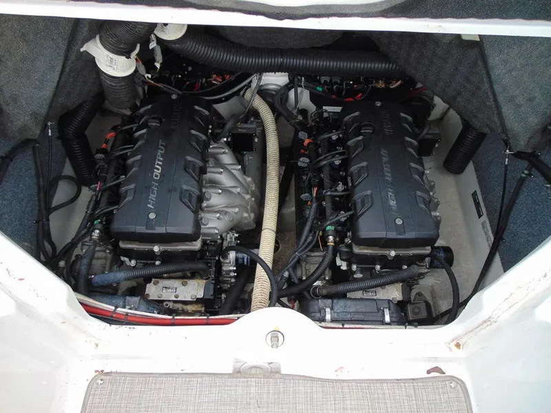 Slide: The Image of 2016 Yamaha Boats 242 Limited engine compartment with twin high output engines. - 12