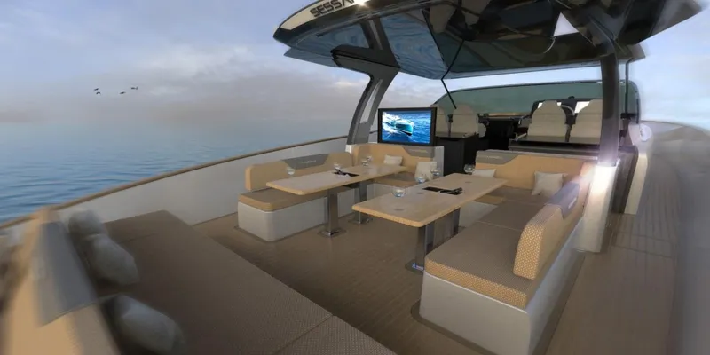 Slide: The Image of 2024 Solaris Power 60 Open luxury yacht interior with dining area and ocean view. - 5