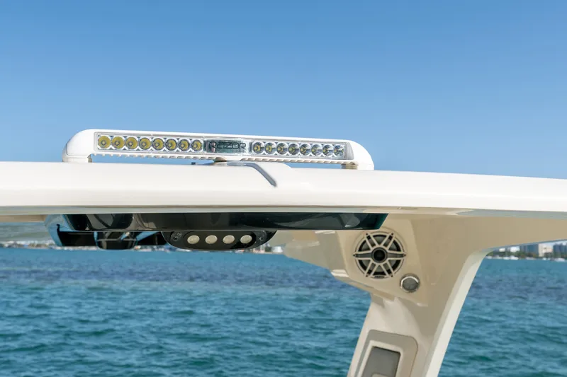 Slide: The Image of 2021 Scout 277 Dorado boat with LED lights and speakers on the deck. - 15