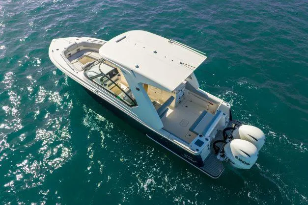 Slide: The Image of 2021 Scout 277 Dorado boat on open water. - 24