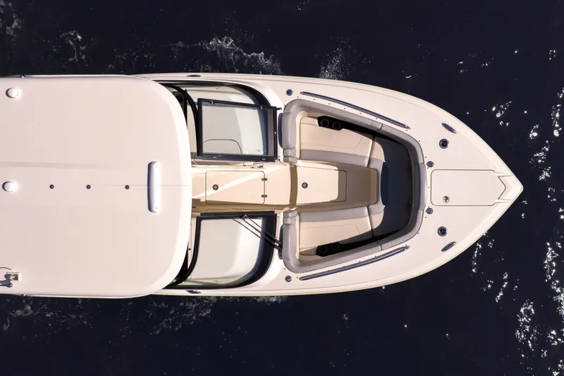 Slide: The Image of 2021 Scout 277 Dorado boat, aerial view, cruising on water. - 26