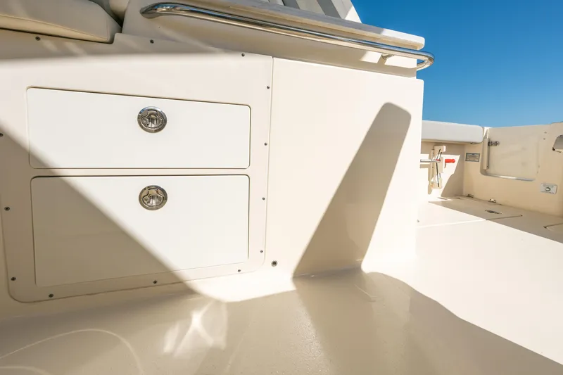 Slide: The Image of 2021 Scout 277 Dorado boat interior with storage drawers. - 5