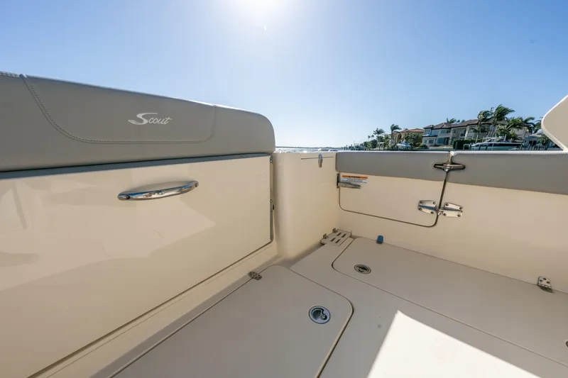 Slide: The Image of 2021 Scout 277 Dorado boat interior with sleek design and coastal view. - 6