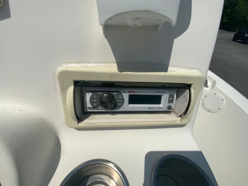 Slide: The Image of 2014 Tidewater 196 CC Adventure boat stereo system. - 14