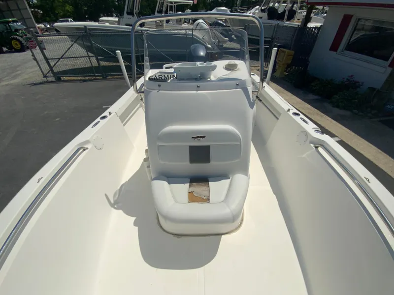 Slide: The Image of 2014 Tidewater 196 CC Adventure boat interior with console and seating. - 21