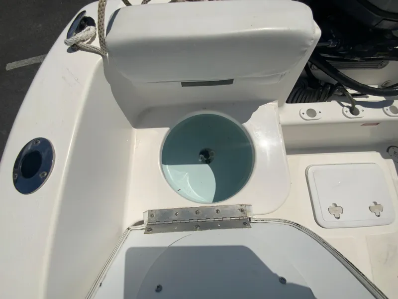 Slide: The Image of 2014 Tidewater 196 CC Adventure boat interior with livewell and seating. - 24