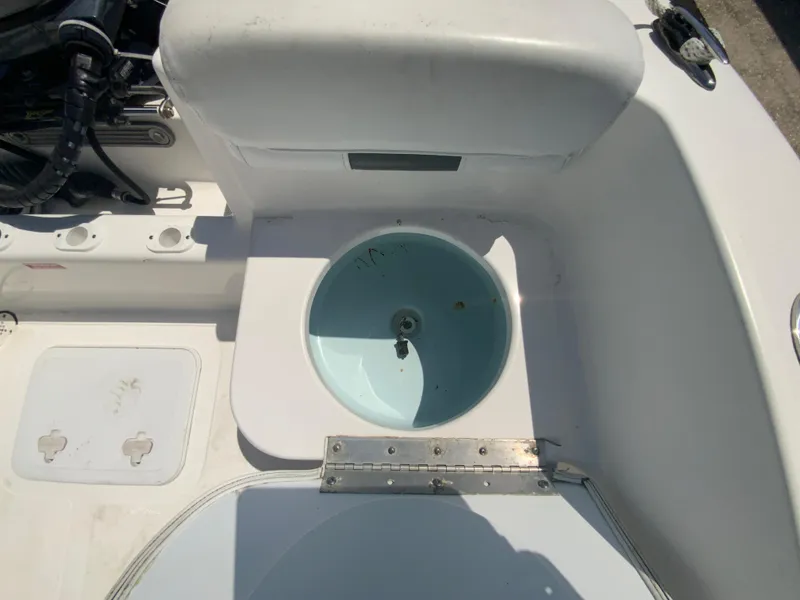 Slide: The Image of 2014 Tidewater 196 CC Adventure boat interior with livewell. - 25