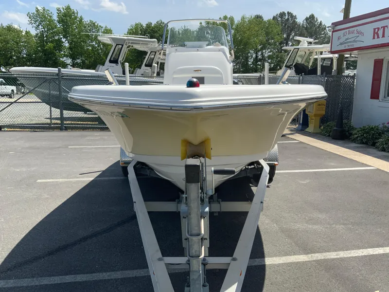 Slide: The Image of 2014 Tidewater 196 CC Adventure boat on a trailer in a parking lot. - 4