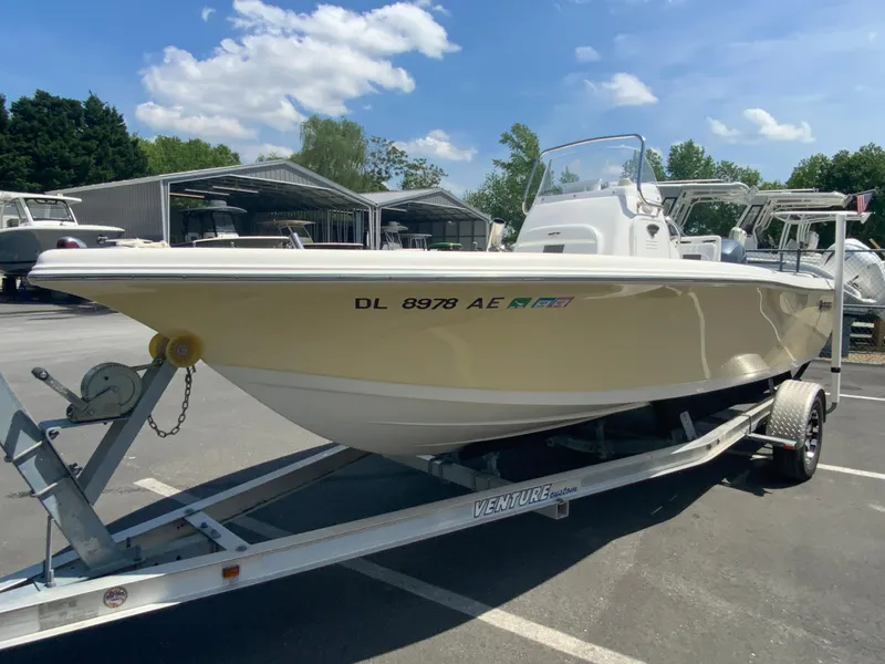 Slide: The Image of 2014 Tidewater 196 CC Adventure boat on trailer in outdoor lot. - 5