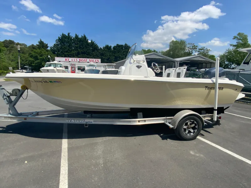 Slide: The Image of 2014 Tidewater 196 CC Adventure boat on a trailer at a boat sales lot. - 6