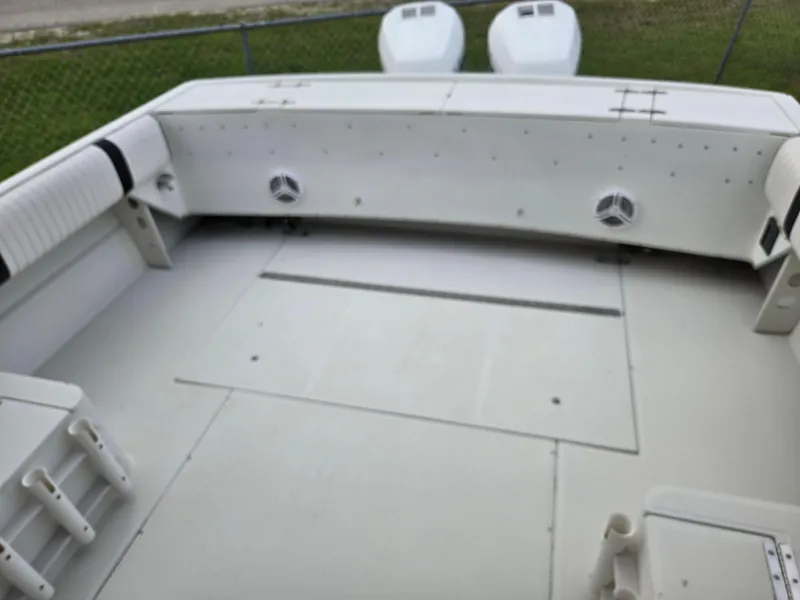 Slide: The Image of 1992 Stamas 288 Liberty boat deck with seating and storage compartments. - 14