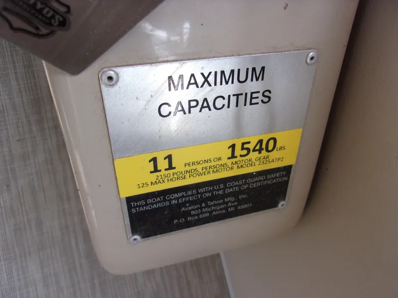 Slide: The Image of 2018 Avalon Catalina Cruise 23' maximum capacities label, 11 persons or 1540 lbs. - 16