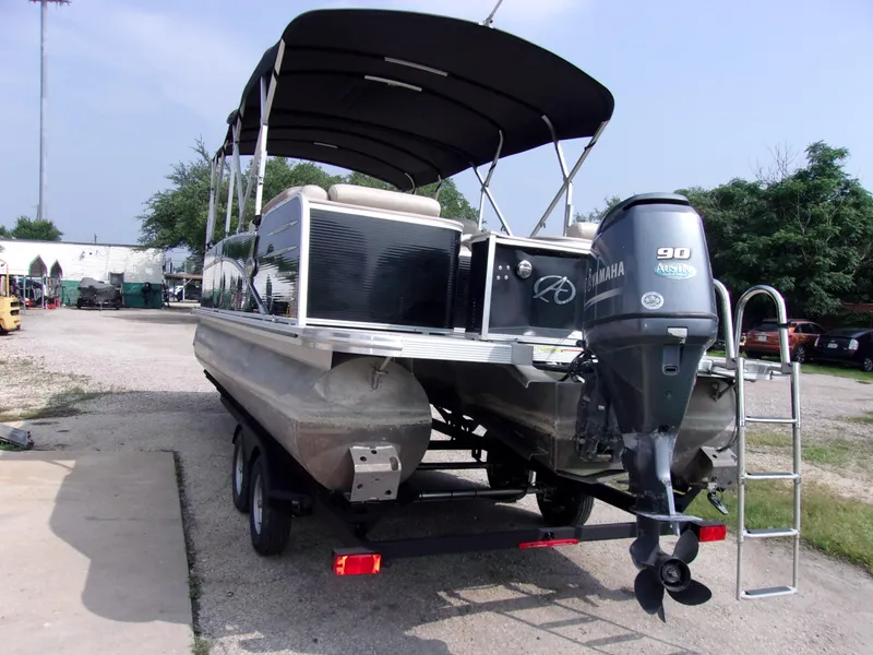 Slide: The Image of 2018 Avalon Catalina Cruise 23' pontoon boat with Yamaha 90 HP engine on trailer. - 3